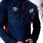 Umbro Medio Cierre PINS Nacional – Buzo Hombre