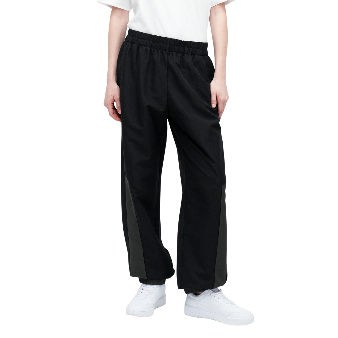 WP53515BK (2) New Balance Graphic Woven Pan - Pantalón Dama - Imagen 1